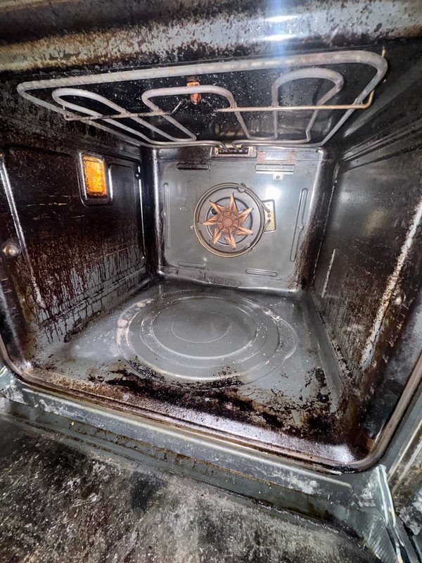 Heavily soiled oven before cleaning